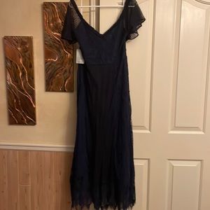 Foxiedox navy dress w/ lace overlay and sheer arms
